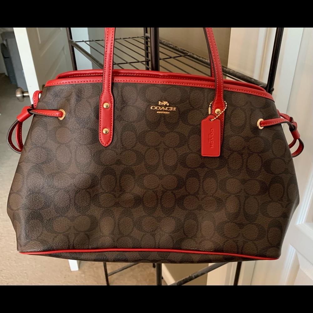 Coach Signature Canvas Satchel.